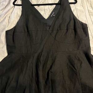 Black Sleeveless V-Neck Peplum Top